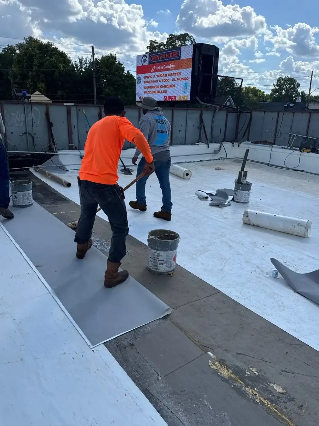 Tarping and dry-in on a Linton commercial roof